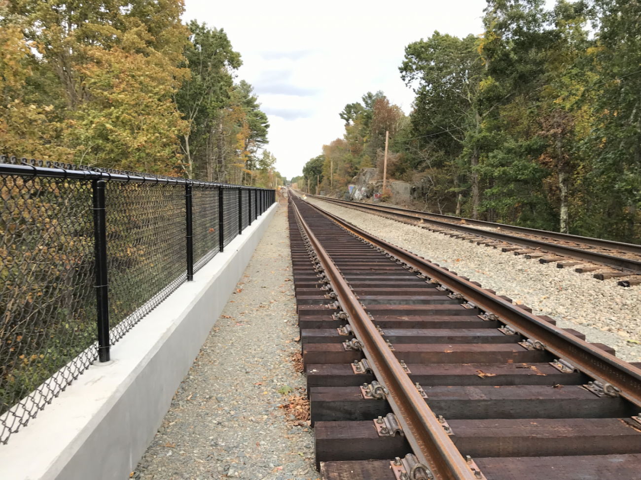 Completed retaining wall with new second track assembled outside of Walpole Station in 2019