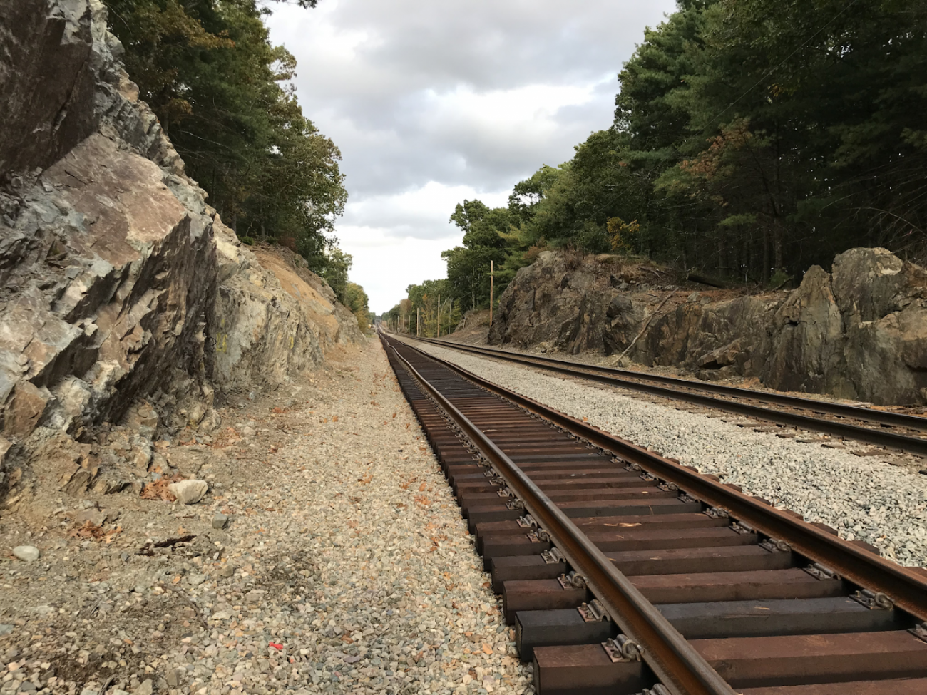 New tracks were installed parallel to the existing track after excavating the adjacent rocks and installing a drainage system (October 2019)