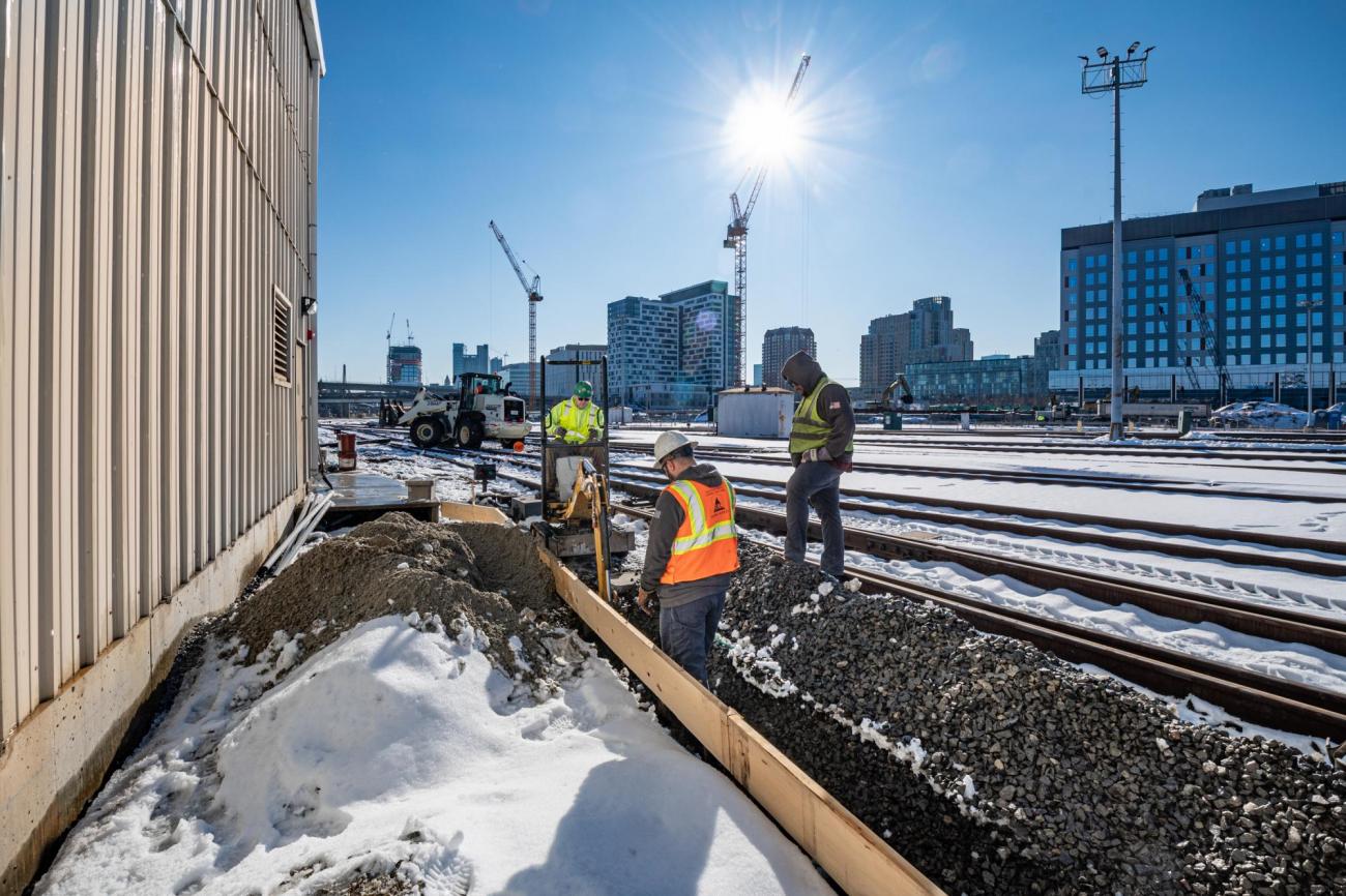 A crew works on PTC upgrades at the Commuter Rail engine terminal in Boston (December 2019)