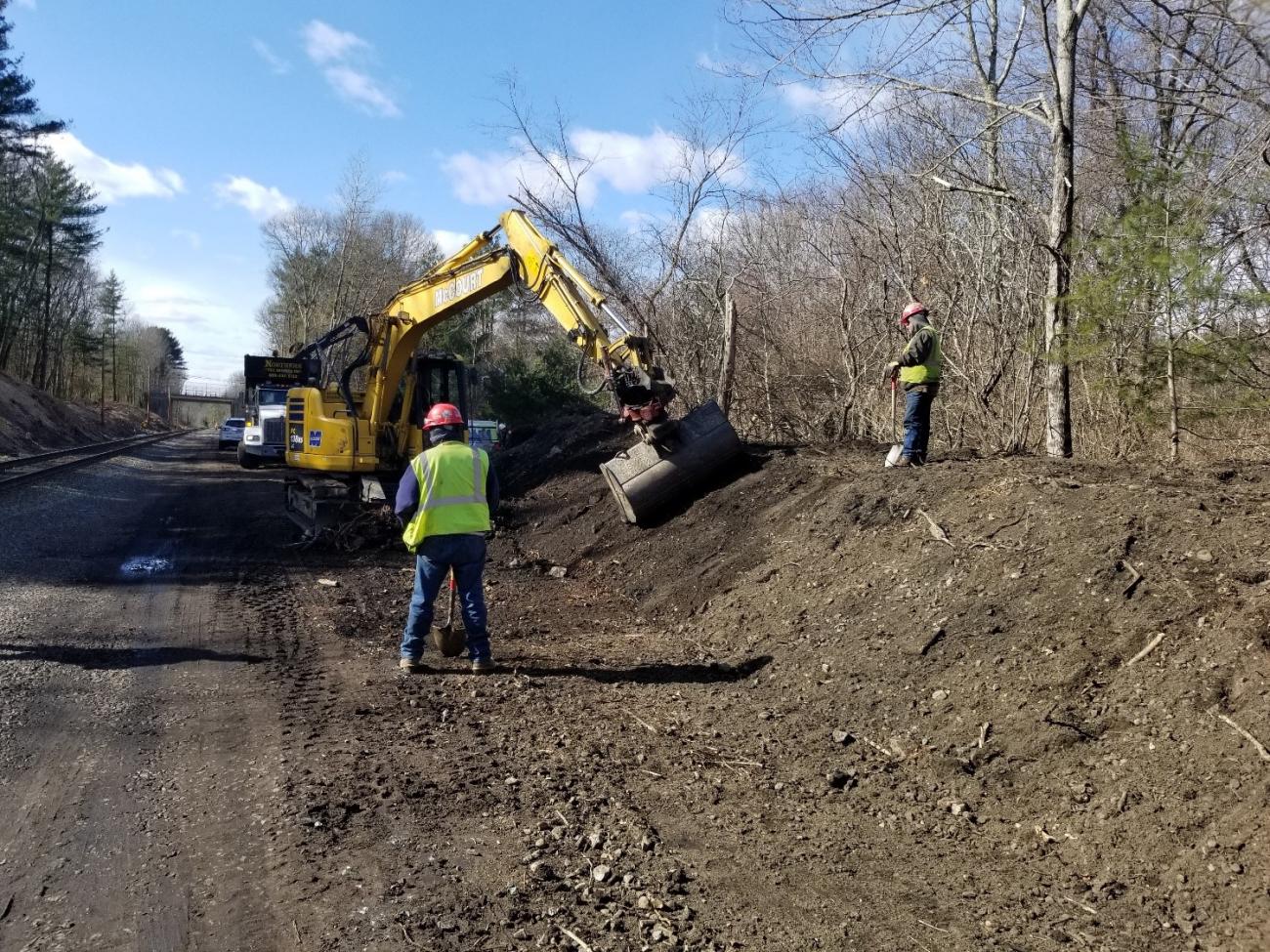 Crew members excavate the area to prepare for new track as Phase 2 of the Franklin Double Track project begins (February 2020)