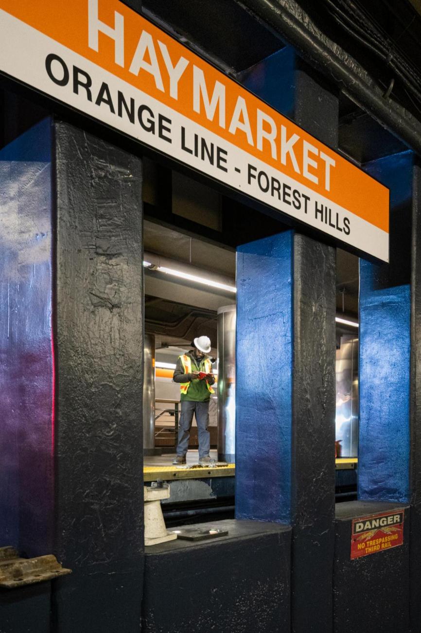 A crew member prepares for rail tie replacement at Haymarket during the final Orange Line weekend shutdown of winter 2020