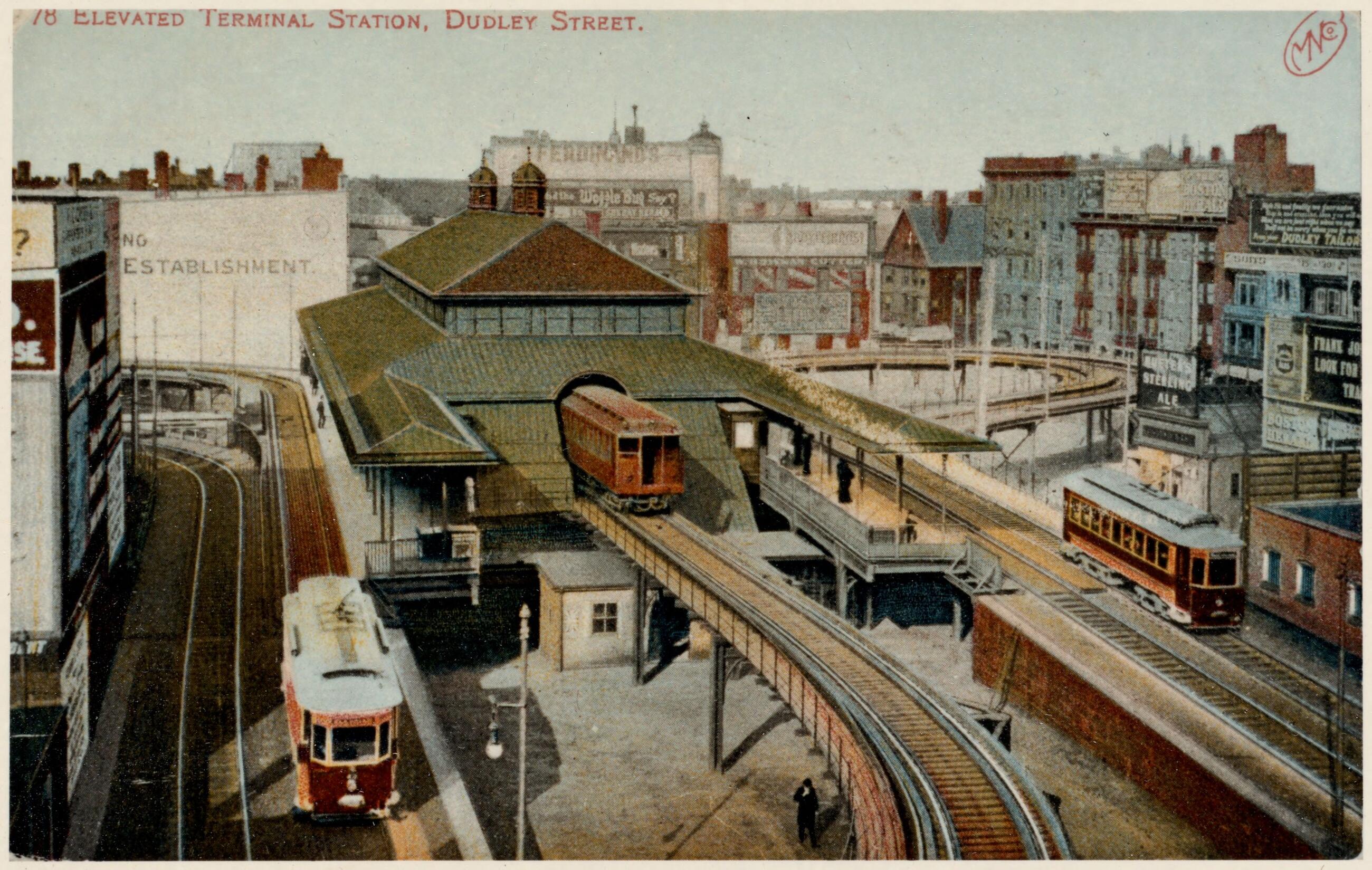 Elevated trains depart from Dudley Station.