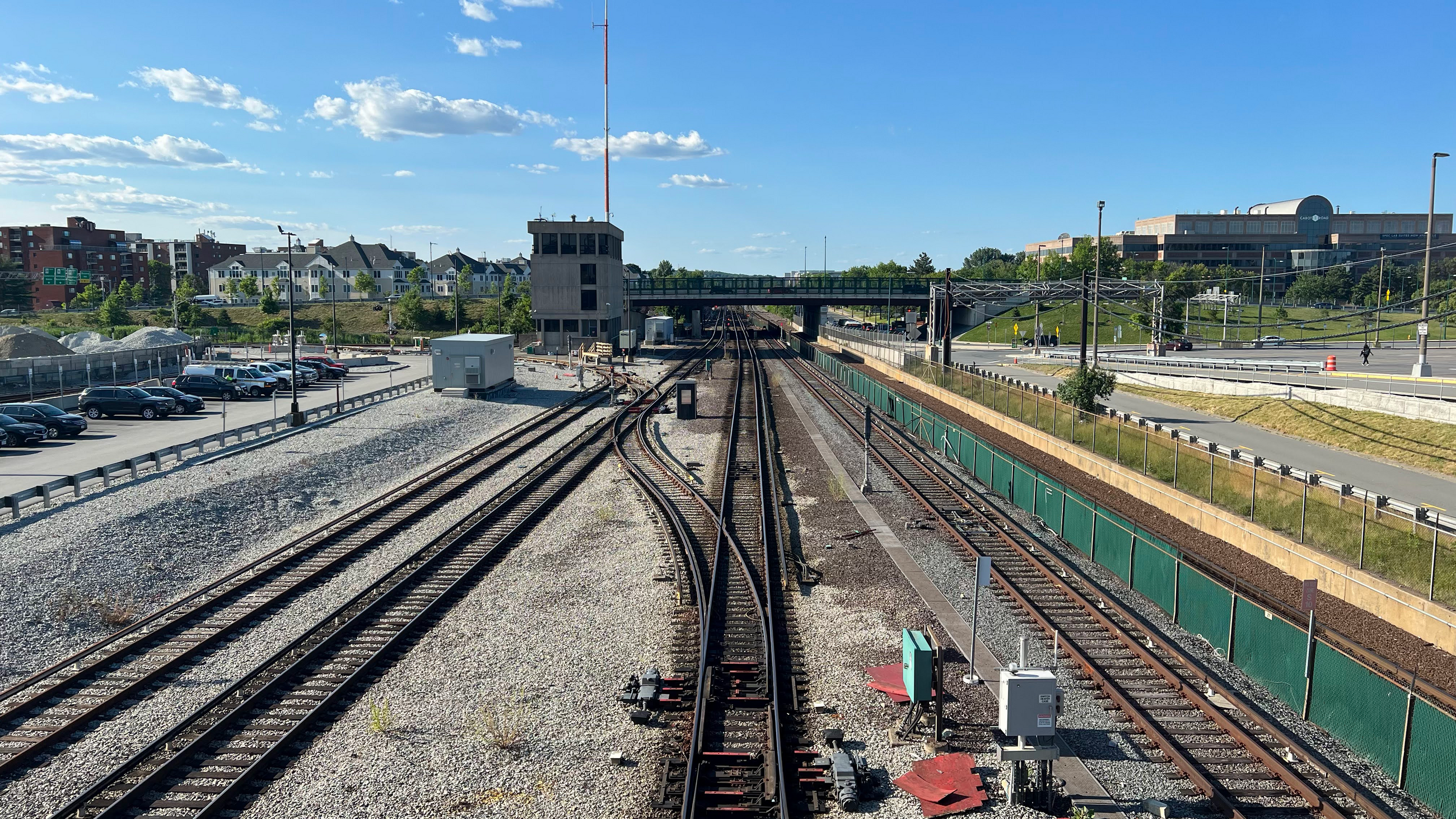 Orange Line tracks and signals near Wellington station on a sunny day